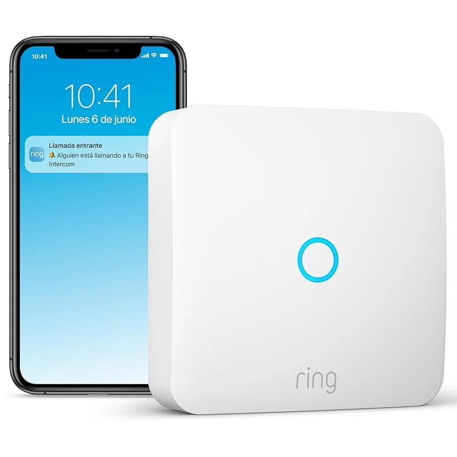 Ring Intercom device beside a phone displaying a call to the entry intercom.
